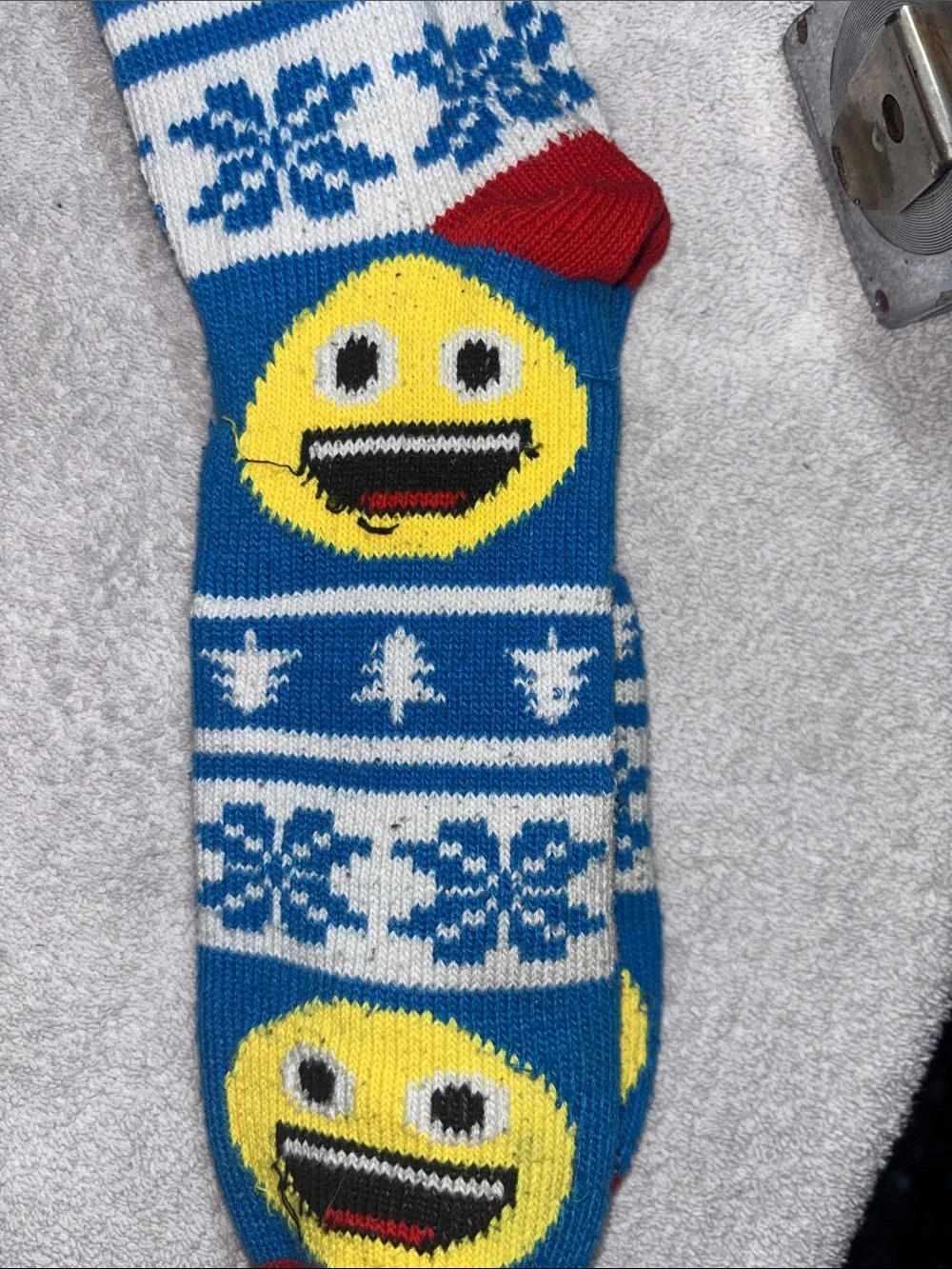 Source Unknown Blue Knit Holiday Stocking with Yellow Emoji and Red Trim